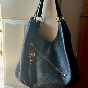 Michael Kors shoulder bag/hobo style.